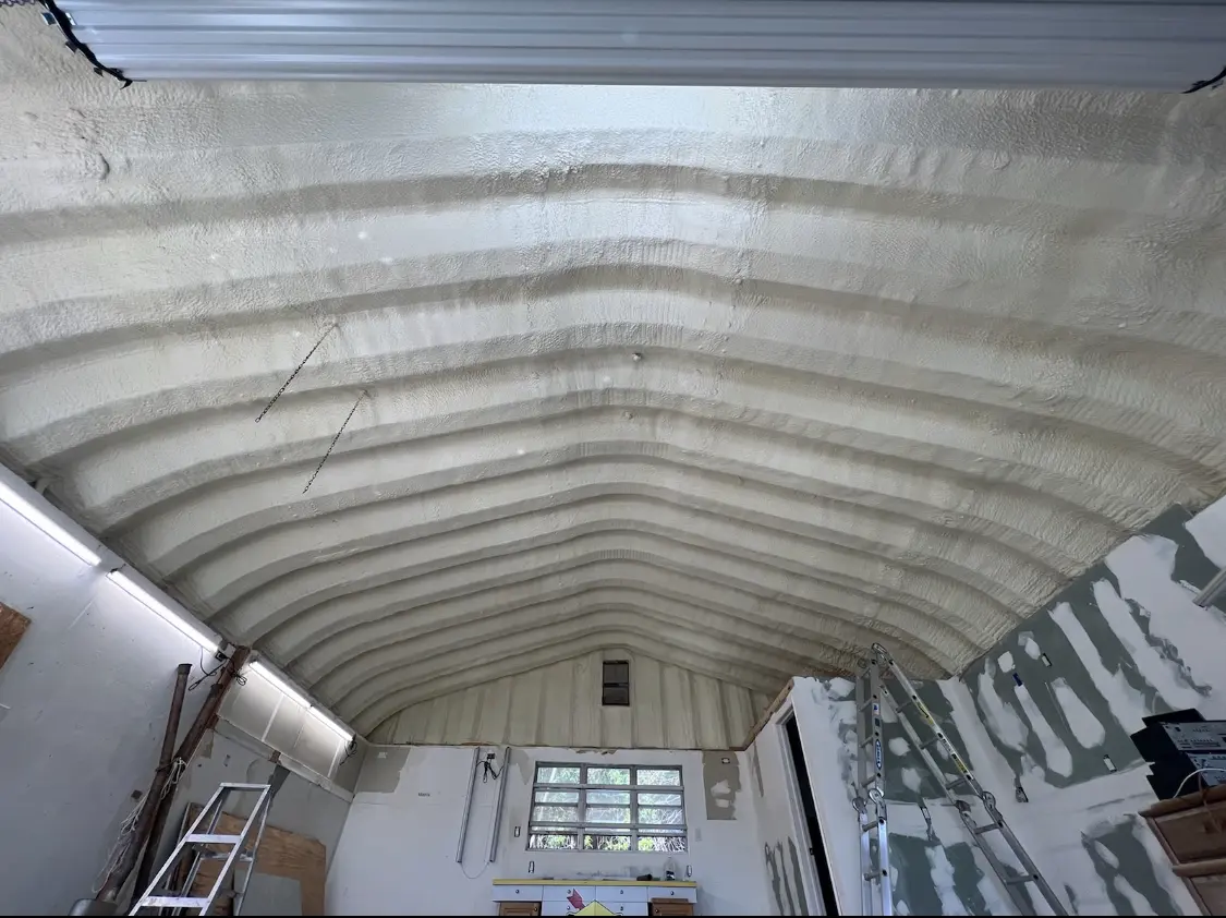 Spray polyurethane foam applied to the underside of a metal roof deck in Horizon City